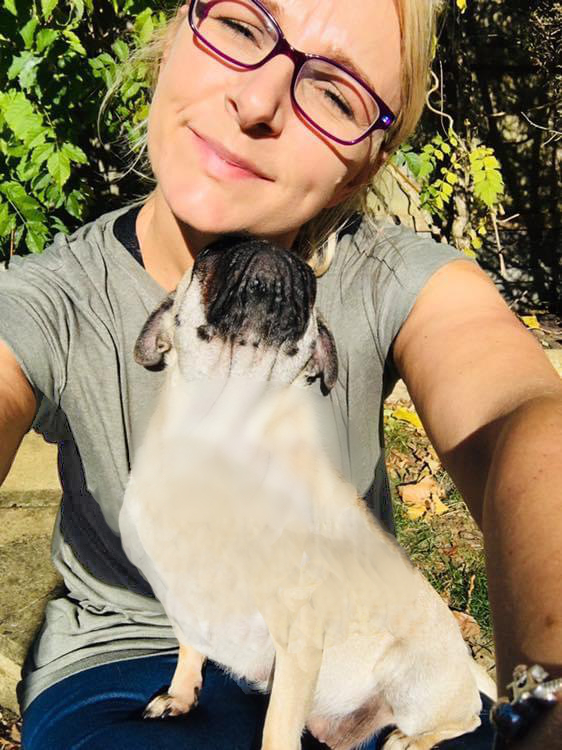 vicki with pug on her lap